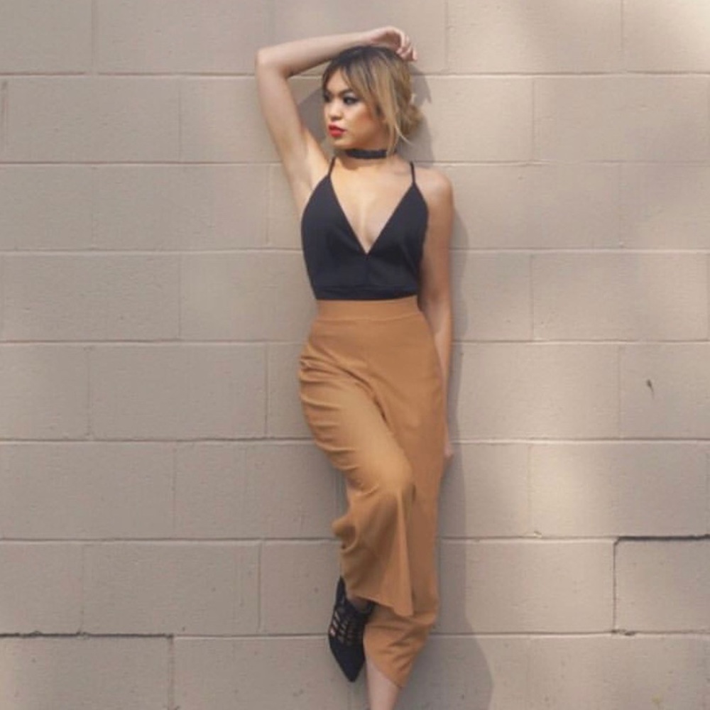 Plunging black bodysuit